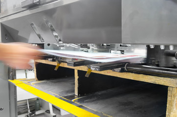 Sheet pulled from printing press.