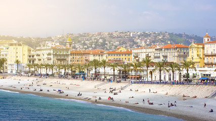 Fototapeta na wymiar Summer holidays in Nice, people sunbathing on summer beach, sunny resort city