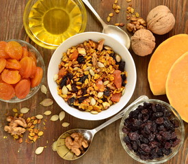 Pumpkin homemade granola with walnuts and dried fruits