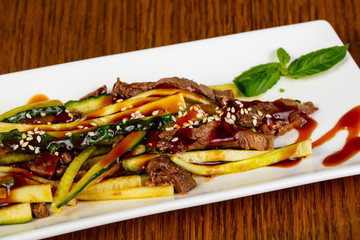 Salad with beef and cucumbers