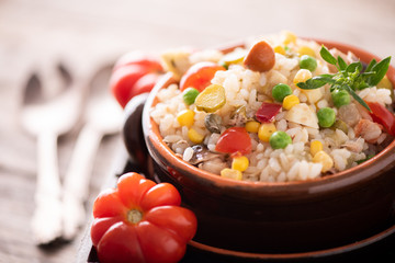 Traditional italian rice salad on wood table