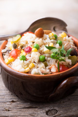 Traditional italian rice salad on wood table