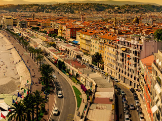 Fototapeta premium Nice, France - 05 May, 2015: Famous Promenade in Nice, France at sunset