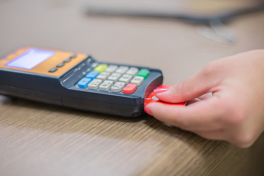 Credit card terminal. Credit Card Processor. Payment machine and Credit card in supermarket.