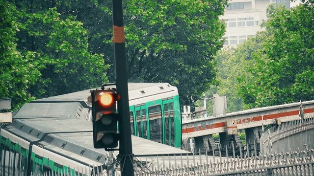 Metro train in Paris in spring rainy day, France. Metro is very popular transport in Paris