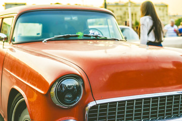 close up rich retro car on a sunset  a vintage style