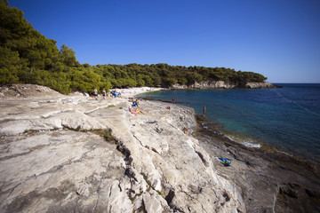 People enjoying Srebrena beach, Vis island - Croatia. 