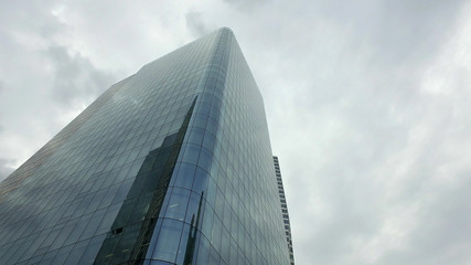 Fototapeta na wymiar Skyscraper building in La Defense business district in Paris, France