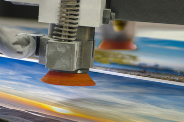 offset machine press print run at table; suction cup detail close up
