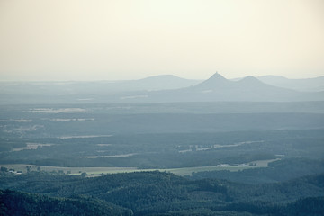 Czech landscape with Bezdez castle on horizont viewed from Jested hill near Liberec city at summer evening sunset 50 years after soviet occupation of Czechoslovakia 1968