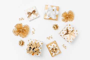 Flat Lay Christmas or Party Background with Gift boxs and  Decorations  in Gold  colors. Flat lay, top view