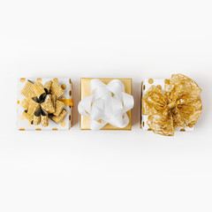 Flat Lay Christmas or Party Background with Gift boxs and  Decorations  in Gold  colors. Flat lay, top view
