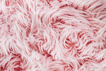 Pink fluffy fur background.  Flat lay, top view