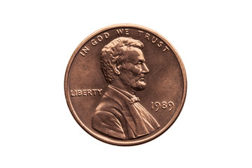 USA one cent penny coin with a portrait image of Abraham Lincoln cut out and isolated on a white...