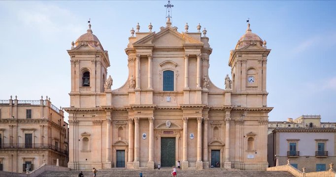 Time-lapse of the sicilian baroque cathedral of Noto with many tourists, Italy