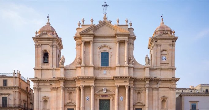Time-lapse of the sicilian baroque cathedral of Noto with many tourists, Italy