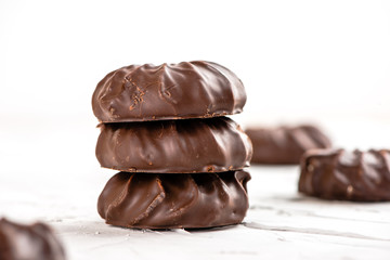 dark chocolate-coated zefir view isolated on white background food dessert