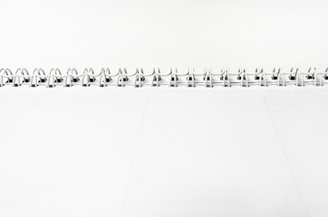 paper notebook with spiral background, selective focus dof