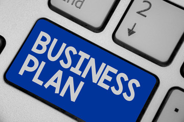 Writing note showing Business Plan. Business photo showcasing Structural Strategy Goals and Objectives Financial Projections Keyboard blue key Intention computer computing reflection document