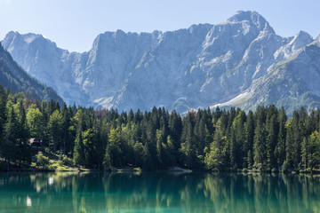 Naklejka na ściany i meble Panorama of mountain lake in the Julian Alps,Laghi di Fusine