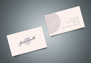 Business Card Layout with Pink Accents