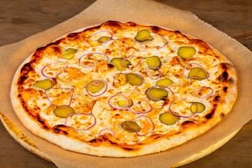 Pizza with pickled cucumbers