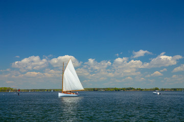 Sailboat on a Chesapeake Bay tributary on the Eastern Shore of Maryland St Michaels Talbot County...