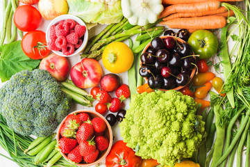 Summer fruits vegetables berries background, apples cherries peaches strawberries cabbage broccoli cauliflower squash tomatoes carrots spring beetroot, copy space, top view, selective focus