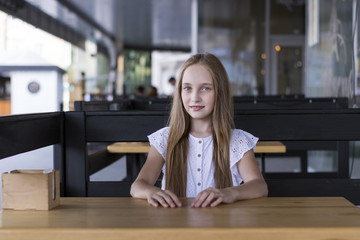 Long-haired lady enjoying lunch time