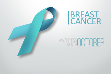 Blue ribbon on a gray background. Concept of fighting against cancer, with breast cancer. World Cancer Day, awareness month. Prevention in the fight against cancer.