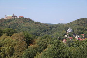 Fototapeta na wymiar View to the Wartburg from the Göpelskuppe at the edge of Thuringian Forest, Eisenach in Germany
