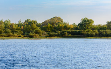 Autumn. Sunset on the river.