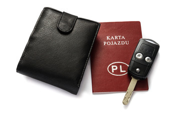 Karta pojazdu, portfel i kluczyk samochodowy. 