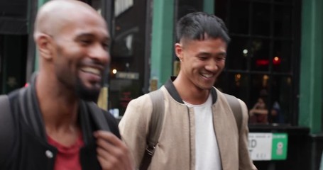 Group of male friends leaving pub - Powered by Adobe