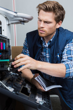 handyman fixing printer according to manual