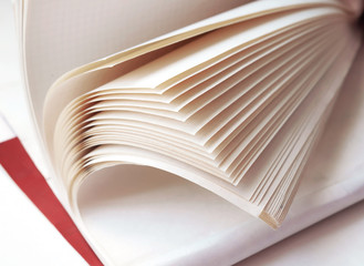 The corner of the net notebooks. White pages notebook.