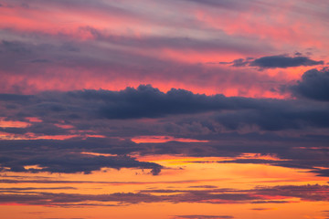 Beautiful sunset orange pink sky with clouds