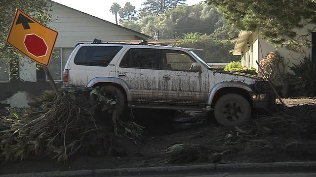 2018 - fire crews inspect damage from the mudslides in Montecito, California following the Thomas fire disaster.