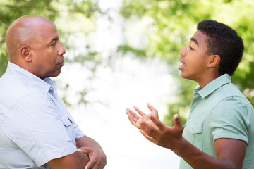 Father and son having a serious conversation.
