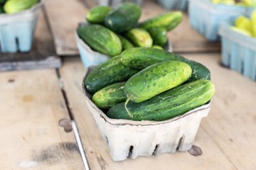 Baskets of Green pickles cucumbers