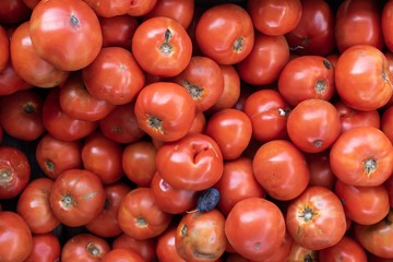 Bunch of red ripe potatoes in market