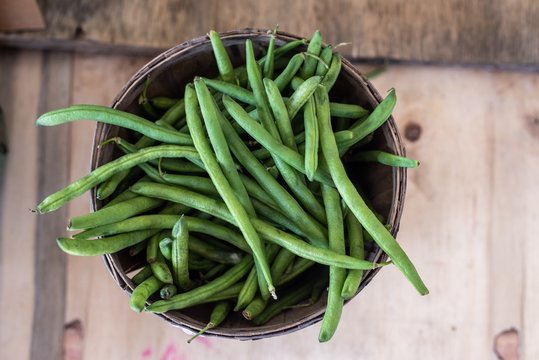 Baskets of green beens for selling in market