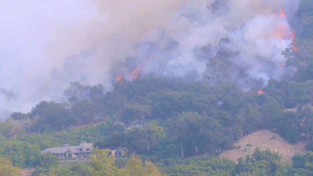 2017 - the Thomas Fire rages above large mansions near Montecito, Santa Barbara County, California.