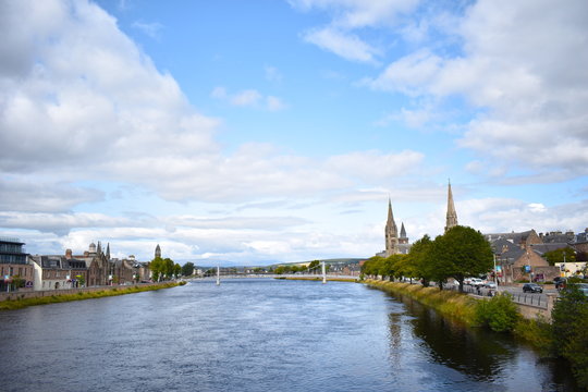 Walk along the river banks from the castle and you'll find the Ness Islands. Inverness, Scotland, UK
