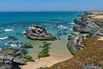 Porto Covo wild beach scenery from the cliffs in Portugal