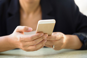 Portrait of an Asian woman smiling.