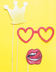 Photo props on yellow background.

