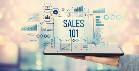 Sales 101 with man holding a tablet computer