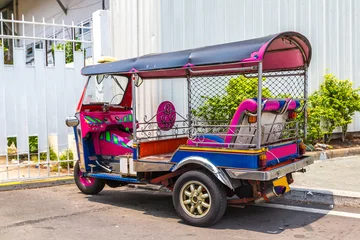 Fotobehang Traditional taxi tuk-tuk in Bangkok © Sergii Figurnyi