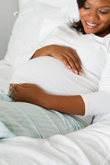 Obraz na płótnie Canvas Young African American pregnant woman.